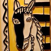 Голова лошади на желтом фоне